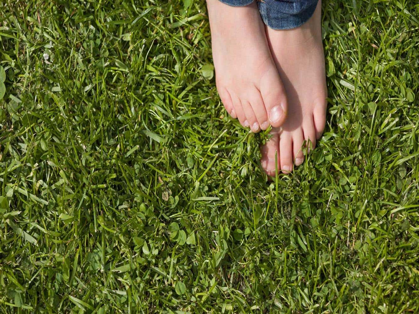 Feet on lawn